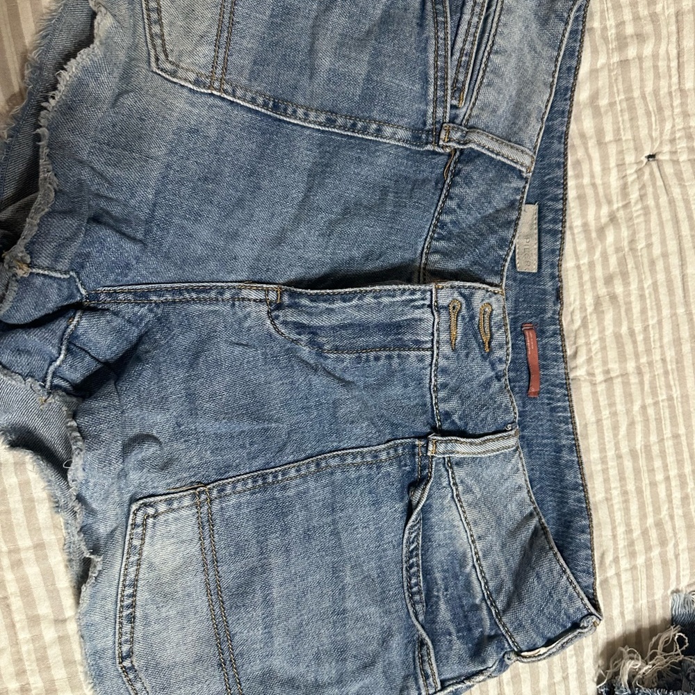 Pilcro medium blue denim shorts with tan stitching